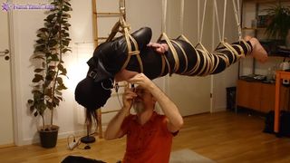 Chick in leather catsuit gets Shibari energy tied, suspended, nipple clamps. Real uncut play!