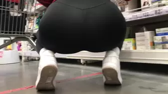 The girl shows her juicy titties and huge behind in the store!