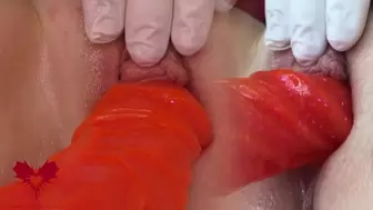 Close up cunt play with the giant red dildo.