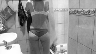 Slim MILF small melons and monstrous behind washes and pees in the shower.