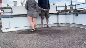 Beautiful pissing mother-in-law helps son-in-law piss on the top of the parking lot