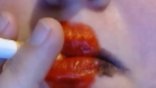 Red Heart Lipstick And Smoking Upclose