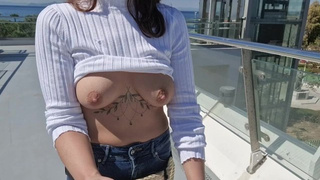 I walk around the city and flash my boobs in public