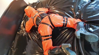 OnlyFans teaser - Heavyrubber latex chick in rainwear and harness!