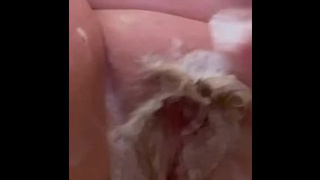 A nice vagina massage while I wash myself.