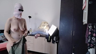 Home-made ex-wife has fun trying on clothes and cutting them. Homemade ex-wife dances naked around the house.