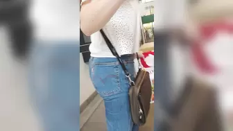 Good looking girl with a beautiful round butt candid