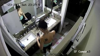 12-01. USA. Titty mom dressing in bathroom