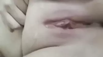 Playing with huge tits in bed