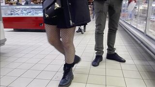 Stunning bitch with dark fishnet stockings and ankle boots